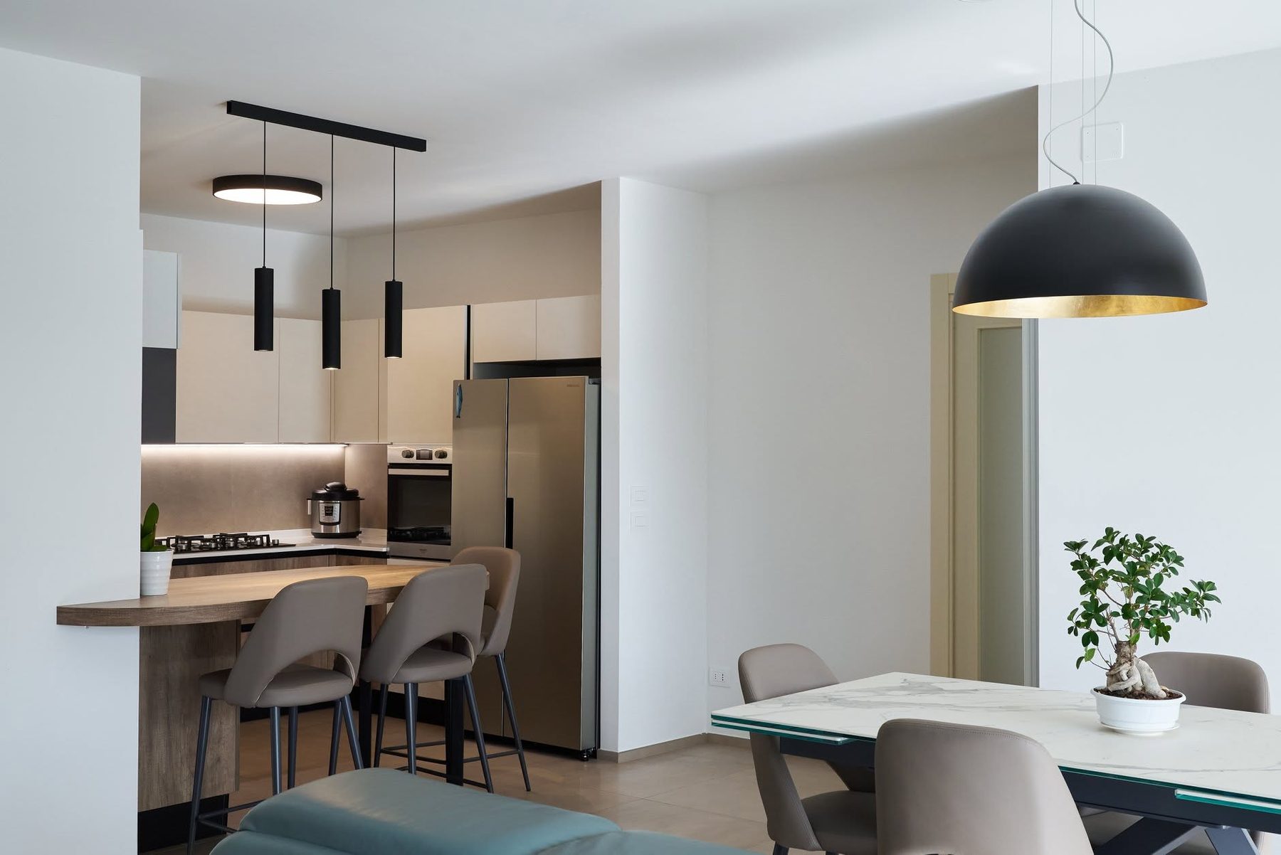 La cucina che diventa tavolo — ARAN cucine Store Pescara